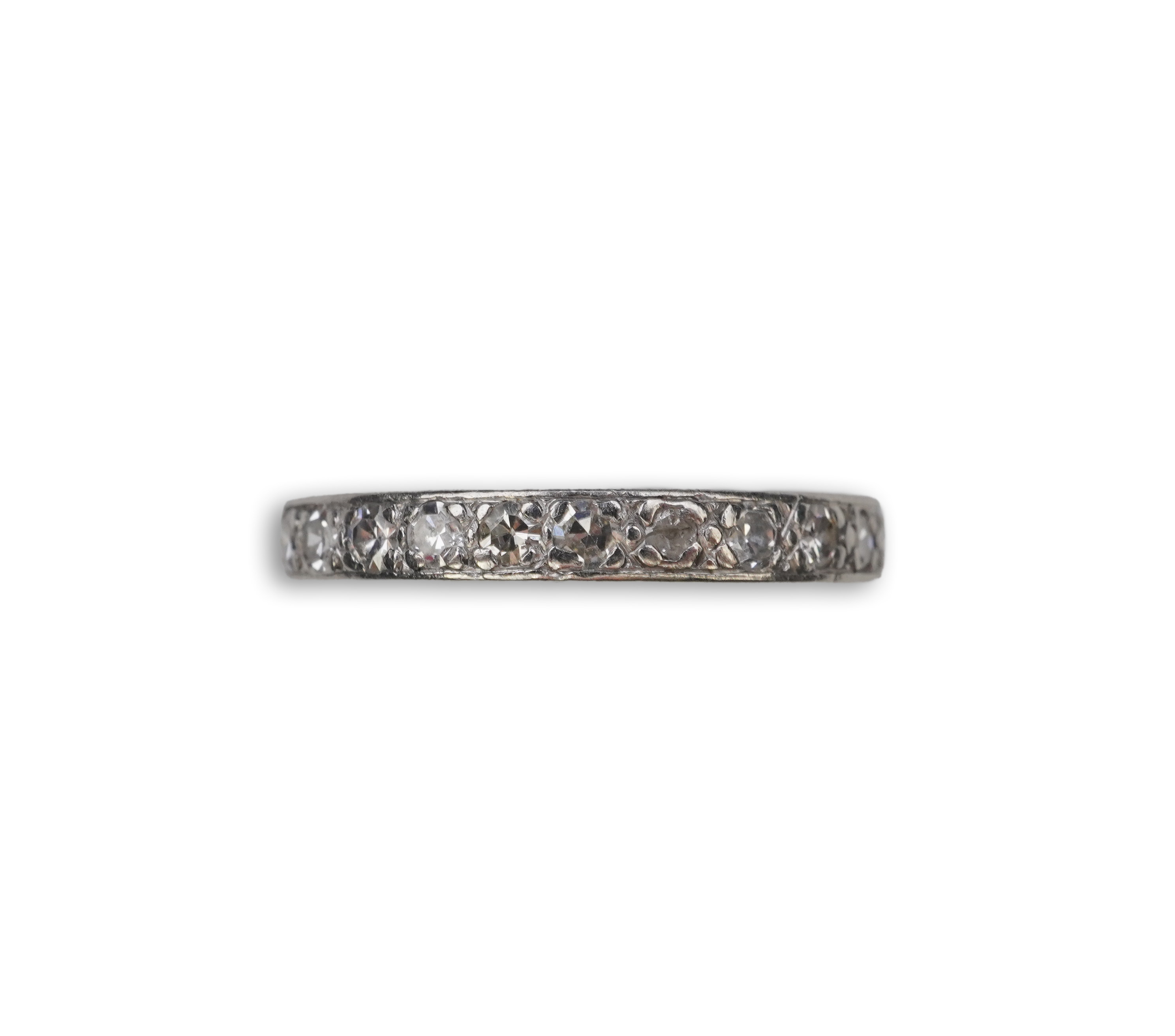 A diamond eternity ring, mid 20th century